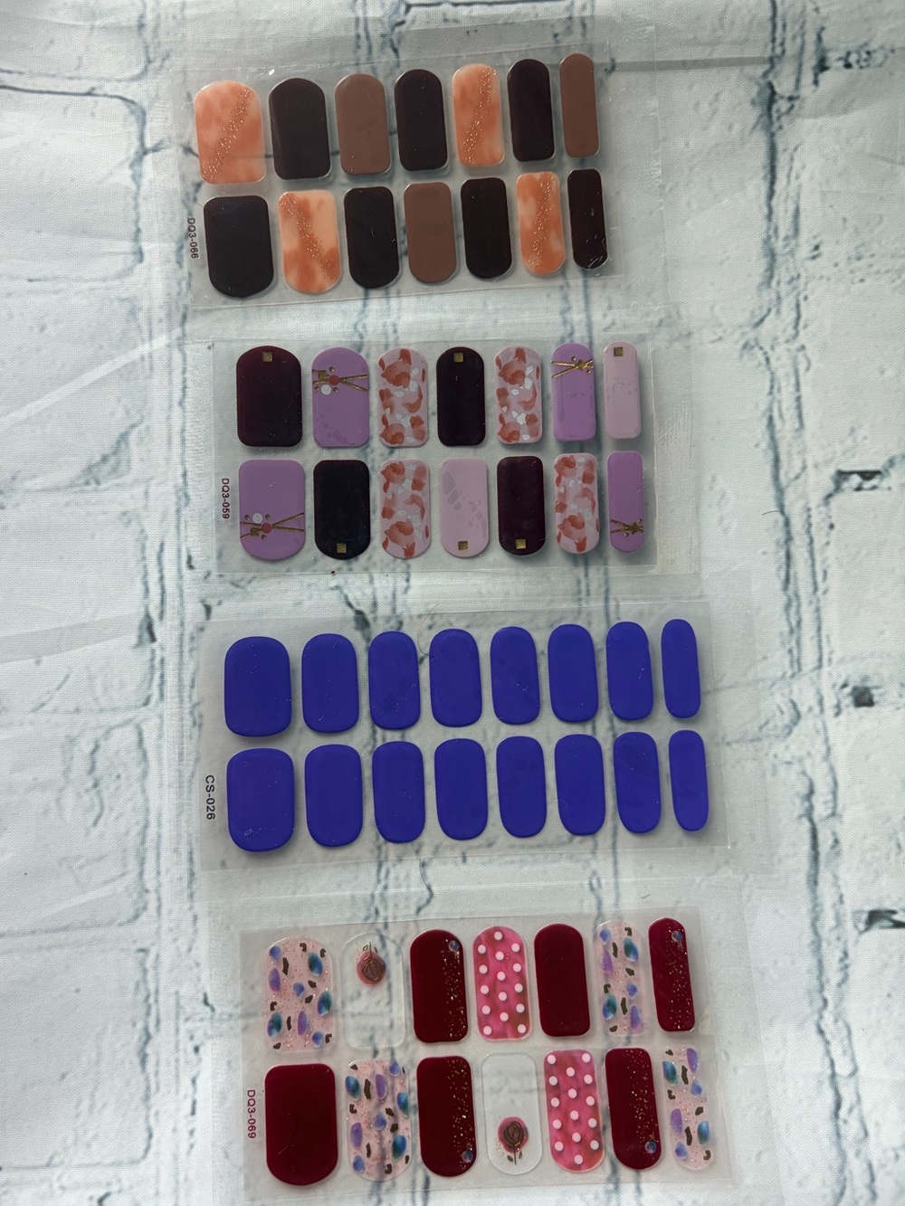 4 Pack Women’s Assorted Nail Wraps Set - Purple, Blue, Pink, Brown, Red.